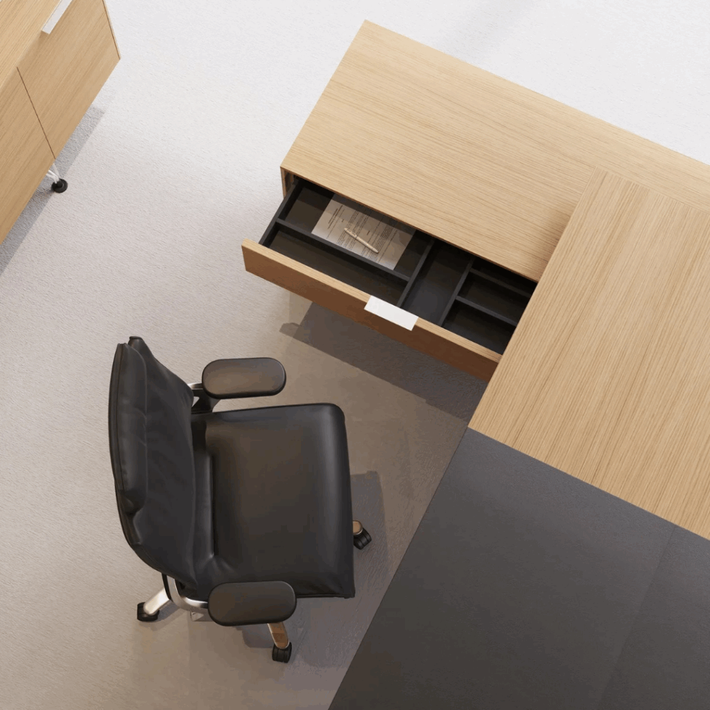 bureau de direction avec caisson intégré et fauteuil ergonomique en cuir noir. vue du dessus